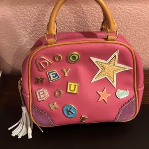 Pink Dooney and Bourke y2k bag.